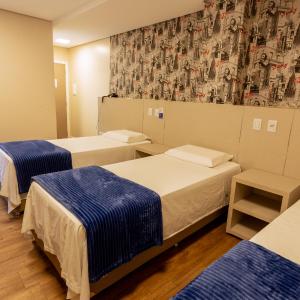 Quarto Triplo (3 camas de solteiro)