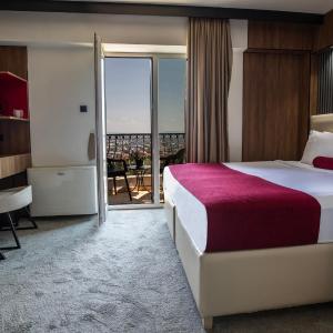 Double or Twin Room with Balcony and City View