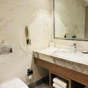  Deluxe Double or Twin Room with 10% off on food & soft beverages, complimentary sauna and steam once during the stay, ( early check in and late check out subject to availability 