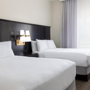 Two-Bedroom Suite with One King and Two Queen Beds - Non-Smoking