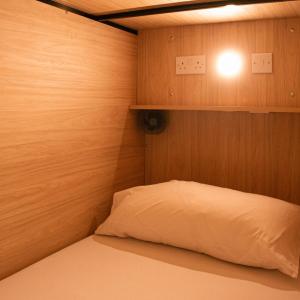 Bed in 8-Bed Female Dormitory Room with Private Bathroom