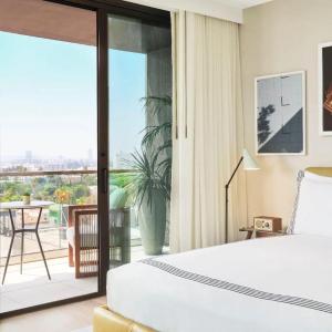 King Room with Balcony and City View - Hearing Accessible