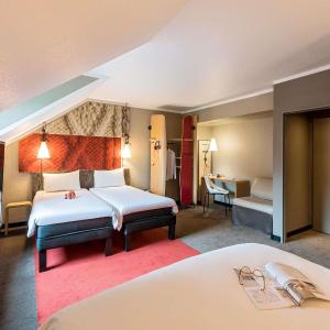 Room with a Double Bed and One Single Bed