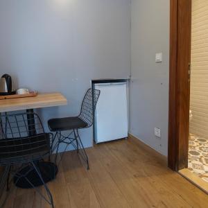GARDEN FLOOR STUDIO BALCONY ROOM