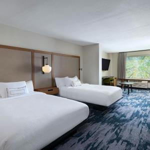 Queen Suite with Two Queen Beds and Sofa Bed