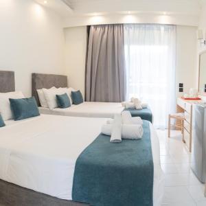 Quadruple Room (2 Adults + 2 Children)