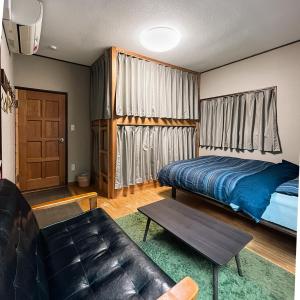 Economy Quadruple Room with Shared Bathroom