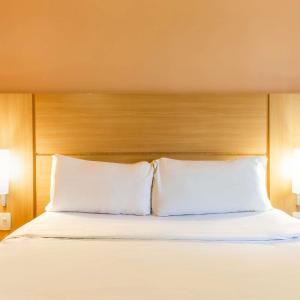 Standard Room with a double bed and a rollaway bed