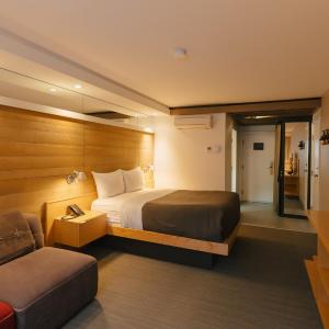 Signature Queen Room with Sofa Bed