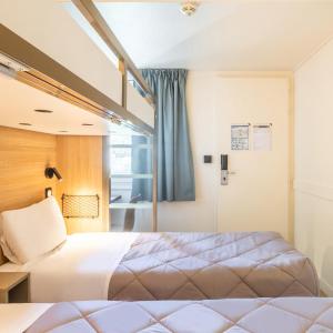 Standard Twin Room with One Bunk Bed