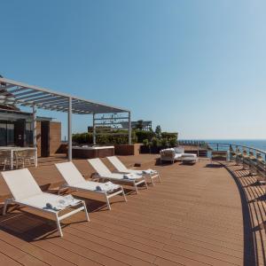 Penthouse Four-Bedroom Apartment with Rooftop Terrace and Sea View