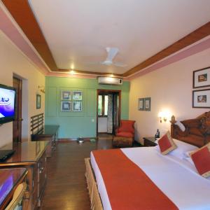 Deluxe Cottage King -  10% Discount on Foods & Soft Beverages* | 15% Discounts on Laundry Services* | INR 500 spa credit during your stay on selective Massage services. TnC Apply.* | Free Mini-bar - 2 cans of soft Beverages (Once on Arrival) 