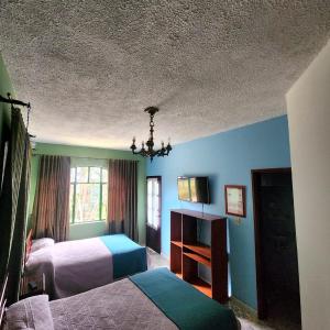 Quadruple Room with Private Bathroom