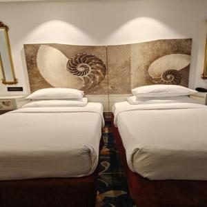 Deluxe Room Twin - 10% Discount on Foods & Soft Beverages* | 15% Discounts on Laundry Services* | INR 500 spa credit during your stay on selective Massage services. TnC Apply.* | Free Mini-bar - 2 cans of soft Beverages (Once on Arrival)