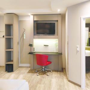 Premium Family Room with One Queen Bed and Two Twin Beds