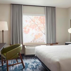 King Room with Sofa Bed and Roll-in Shower - Mobility and Hearing Accessible