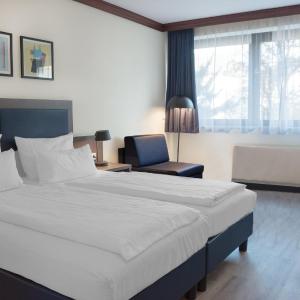 Twin Room with Two Single Beds and Sofa Bed