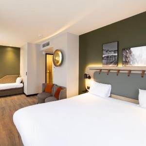 Quadruple Room with One Double Bed and Two Single Beds or Sofa Bed