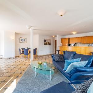 Two-Bedroom Penthouse Apartment with Balcony