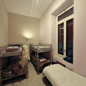 Single Bed in Female Dormitory Room