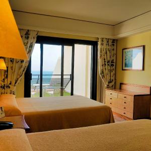Double or Twin Room with Side Sea View