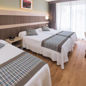 Triple Room (2 Adults + 1 Child)