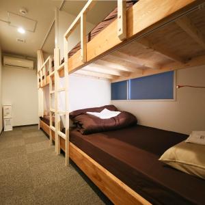 Room with Bunk Bed and Shared Bathroom