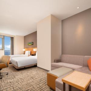 Twin Room with Sofa Bed and View