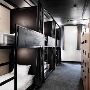 Single Bed in Mixed Dormitory Room with Shared Bathroom 