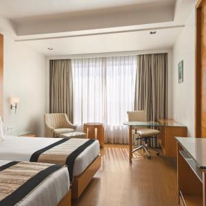 Deluxe Twin Non-Smoking Room : Enjoy a Buy One Get One offer at Fire Ball Bar (11 AM - 8 PM) on House Brand, 15% off on Food & Soft Beverages and Spa, Early checkin Available up to 2 hours (subject to availability)