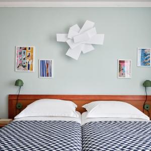 Twin Room with Balcony and Courtyard View (2 Adults + 1 Child )
