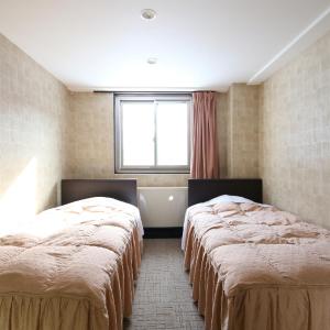 Twin Room with Shared Bathroom