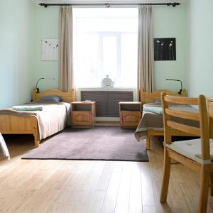 Private Triple Room with Shared Bathroom