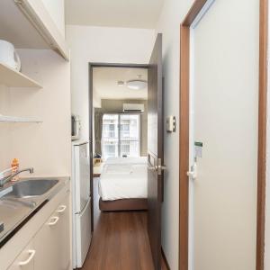 2 Adjoining Twin Rooms with Tatami Area in Condo Bldg – Kitchen, Washer & Lounge Access