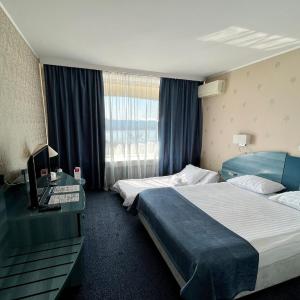 Superior Double Room with extendable armchair and River View 