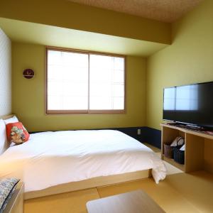 Room Selected at Check-In - No Daily Cleaning - Non-Smoking