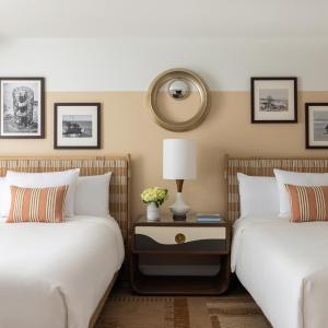 Two Bedroom Oceanfront Suite with 1 Queen and 2 Double Beds