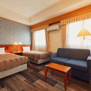 Standard Twin Room with Sofa - Non-Smoking