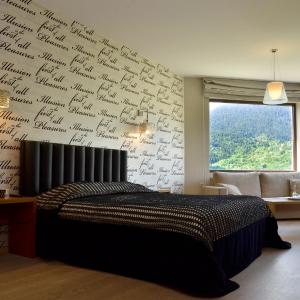 Junior Suite with Fireplace and Forest View