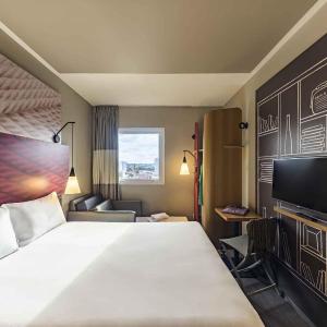 Standard Room with double bed and sofa