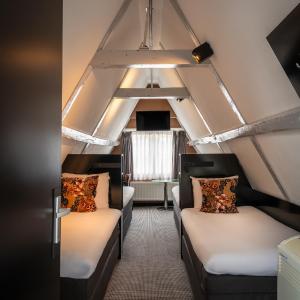 Attic Quad Room with Limited Elevator Access