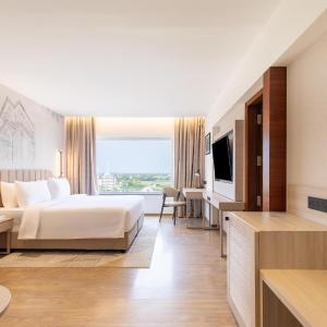 Premium Room with Complimentary Shuttle Pickup and Drop to Sai Baba Temple and Guaranteed early check in and late Check out upto 3 hours (Subject to availability)