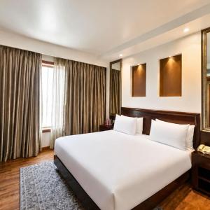 Club Double Suite-Non-Smoking: Enjoy a Buy One Get One offer at Fire Ball Bar (11 AM - 8 PM) on House Brand, 15% off on Food & Soft Beverages and Spa, Early checkin upto 2hrs(subject to availability),Comp. 2 Head Massage(15min) prior appointment reqd