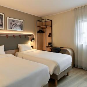 Standard Double Room with Two Single Beds and Sofa Bed