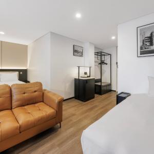 Premium Room with One Queen Bed and One Super Single Bed