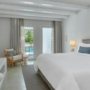 Junior King Suite with Sharing Pool and Poolside View