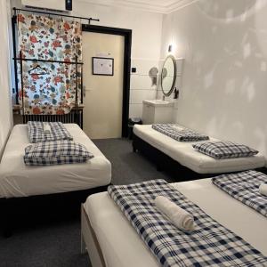 Economy Quadruple Room with Shared Bathroom