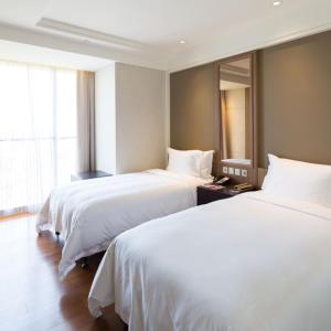 Two-Bedroom Suite with Four Single Beds