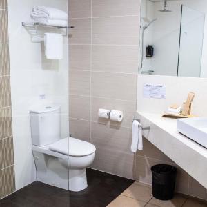 Deluxe Suite with One Queen Bed and Two Single Beds