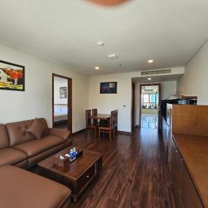 One-Bedroom Apartment with Balcony and City View